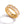 Gold-tone eternity ring with rectangular zircon stones in bezel settings around the band.