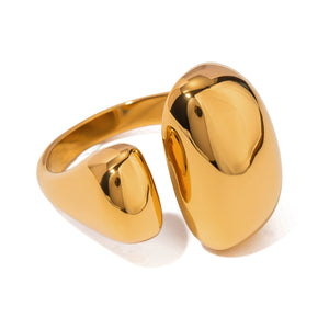 Gold-tone open ring with asymmetrical polished domed ends