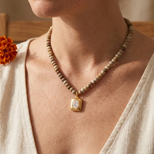 Corrected necklace lifestyle image with clasp hidden behind the neck