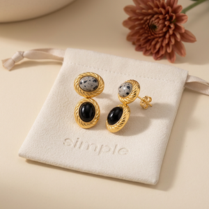 Dalmatian Jasper & Black Onyx Drop Earrings on the cream simple pouch