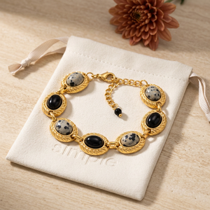 Dalmatian Jasper & Black Onyx Oval Link Bracelet on the cream simple pouch