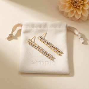 Double-Row CZ Tassel Earrings on pouch