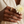 Multi Zircon Band Ring lifestyle close-up with rectangular stones and an ivory chrysanthemum
