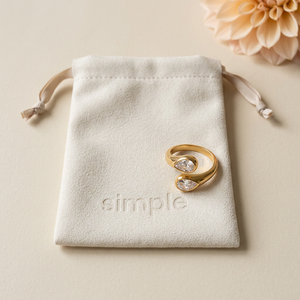 Natural photographic revision of Double Teardrop Cuff Ring on pouch