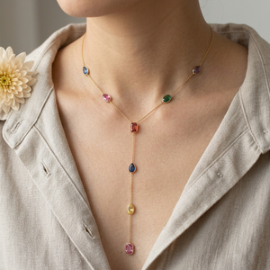 Necklace-only lifestyle image with linen-colored blouse