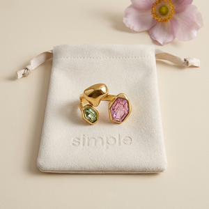 Pink & Green Zircon Geometric Open Ring on the original simple pouch with a pale-pink anemone