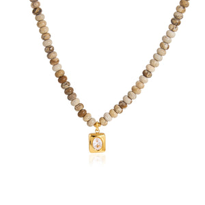 Earthy Beaded Square Pendant Necklace on a white background