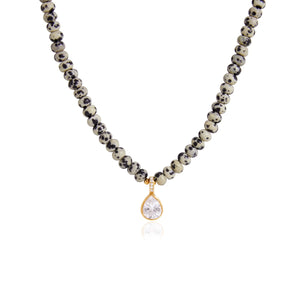 Spotted Beaded Teardrop Pendant Necklace on a white background