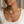 Square lifestyle close-up of the Everyday Star Necklace on a young adult woman