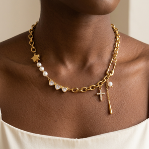 Square lifestyle close-up of the Pearl Zircon Cross Necklace