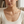 Square lifestyle close-up of the Zircon Cherry Necklace