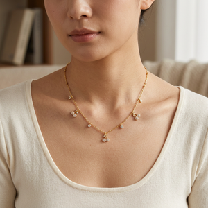 Square lifestyle close-up of the Zircon Cherry Necklace
