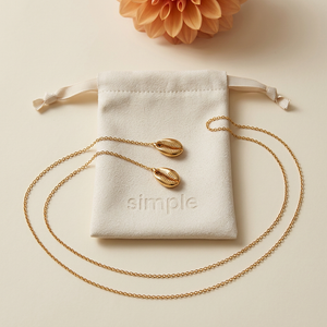 Textured Shell Wrap-Around Necklace on pouch