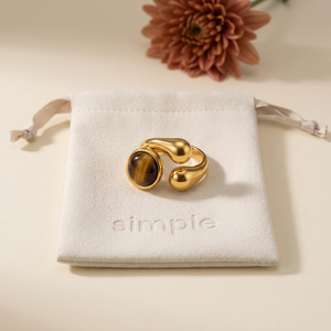 Tiger’s Eye Sculptural Open Ring on the cream simple pouch
