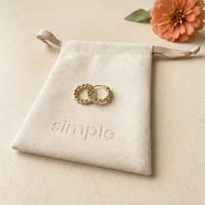 Warmer seasonal background revision for your earrings-on-pouch photo